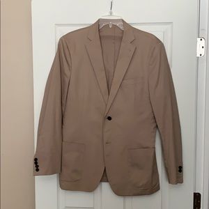 Deconstructed patch pocket functional button holes